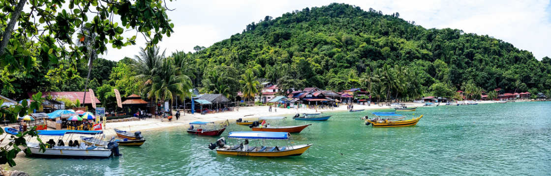 View of a beach with boats in Malaysia