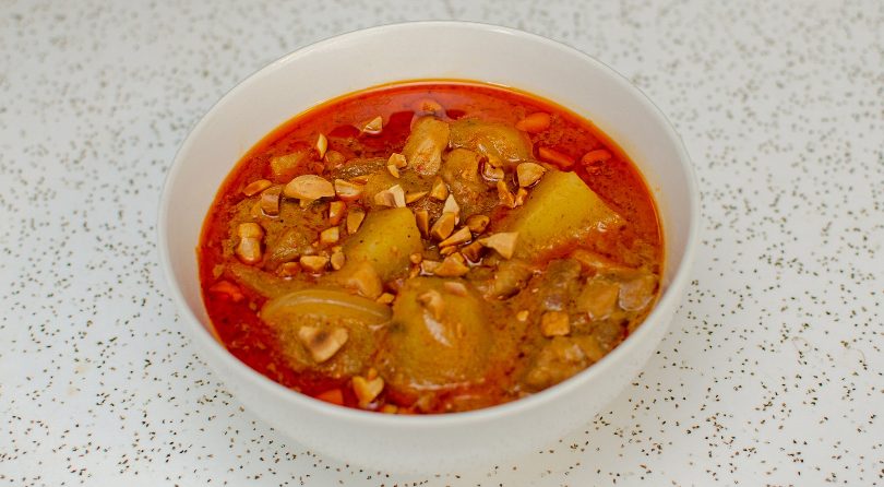 A bowl of of chicken Massaman Curry