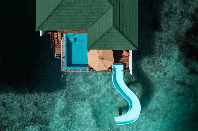 Lagoon villa with slide at Siyam World