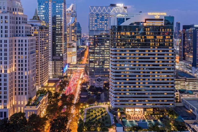 Night view of The Athenee Hotel building