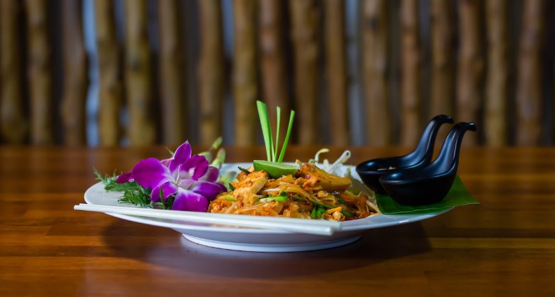 A plate of halal pad thai