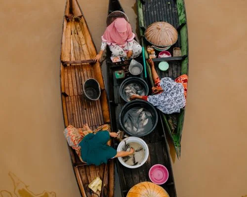 Muslim women in floating market, Malaysia