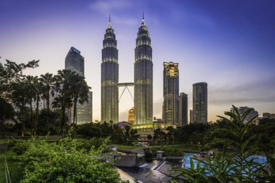 View of Petronas Towers at sunset